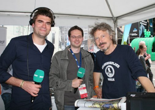 EMM 2013: BRF-Moderatoren Emmanuel Zimmermann und Olivier Krickel mit Wolfgang Niedecken