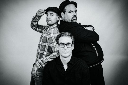 Julian und Roman Wasserfuhr (hinten) mit Jörg Brinkmann